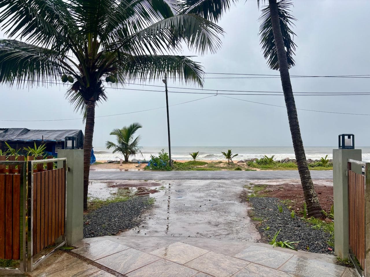 Beach gate opening to the Arabian Sea at Olam by the Sea